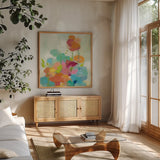 Longstem Bouquet II Square I by Silvia Vassileva. Shown in a natural wood frame in a cozy modern living room. Available as an archival giclee rolled canvas, fine art paper, or poster print. SKU 36443a.