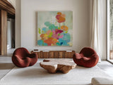 Longstem Bouquet II Square I by Silvia Vassileva. Shown as extra-large giant wall art in a modern living room. Available as an archival giclee rolled canvas, fine art paper, or poster print. SKU 36443a.