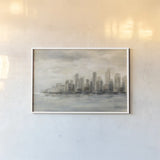 Manhattan Low Clouds by Silvia Vassileva. shown as a paper print in a white frame. Available as a archival giclee rolled canvas, fine art paper, or poster print. SKU 49262i.
