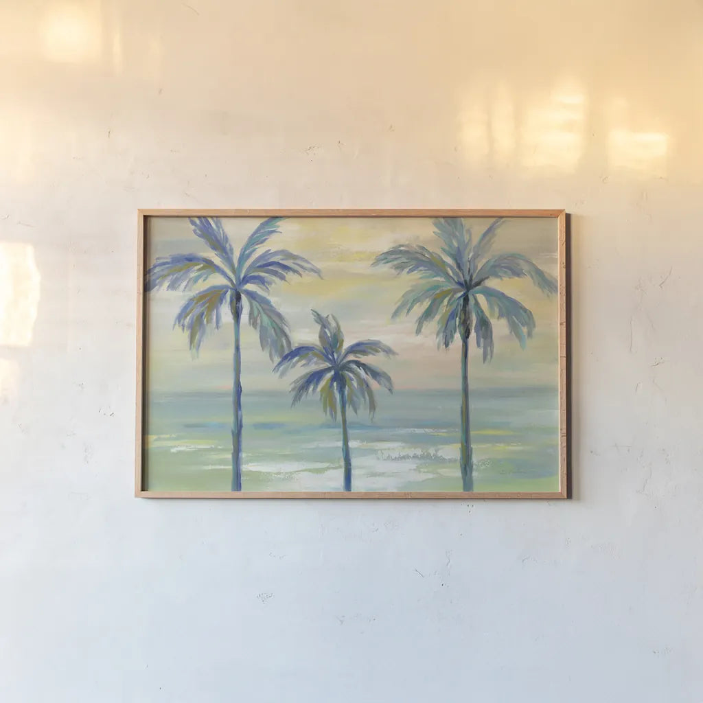 Marine Layer Palms by Silvia Vassileva. shown as a paper print in a natural frame. Available as a archival giclee rolled canvas, fine art paper, or poster print. SKU 35834i.