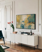 Mid Mod Mood Blue Crop by Silvia Vassileva. shown as a framed stretched canvas in a living room above a console. Available as a archival giclee rolled canvas, fine art paper, or poster print. SKU 65022i.