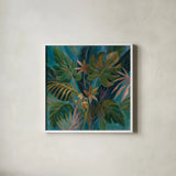 Midnight Tropical Leaves by Silvia Vassileva. Shown in a crisp white glass frame for a clean and minimalist style. Available as an archival giclee rolled canvas, fine art paper, or poster print. SKU 67913a.
