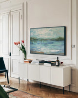 Mirrored Sky Crop by Silvia Vassileva. shown as a framed stretched canvas in a living room above a console. Available as a archival giclee rolled canvas, fine art paper, or poster print. SKU 21616i.