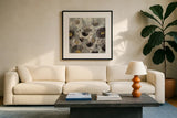 Morning Bloom Greige by Silvia Vassileva. Displayed in a glass frame with matte in a clean modern living room. Available as an archival giclee rolled canvas, fine art paper, or poster print. SKU 20096a.