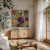 Morning Floral Crop Magenta Flower by Silvia Vassileva. Shown in a natural wood frame in a cozy modern living room. Available as an archival giclee rolled canvas, fine art paper, or poster print. SKU 28868a.