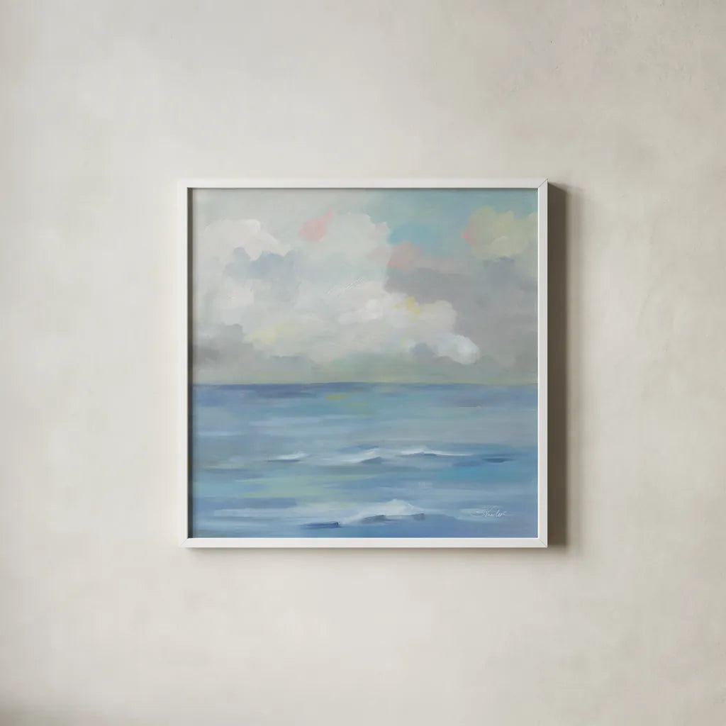 Morning Seaside Clouds by Silvia Vassileva. Shown in a crisp white glass frame for a clean and minimalist style. Available as an archival giclee rolled canvas, fine art paper, or poster print. SKU 71289a.