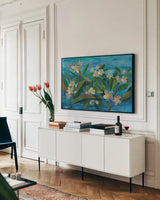 Oceanside Plumeria by Silvia Vassileva. shown as a framed stretched canvas in a living room above a console. Available as a archival giclee rolled canvas, fine art paper, or poster print. SKU 68341i.