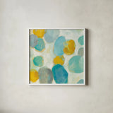 Painted Pebbles III by Silvia Vassileva. Shown in a crisp white glass frame for a clean and minimalist style. Available as an archival giclee rolled canvas, fine art paper, or poster print. SKU 22335a.