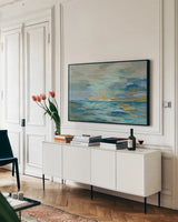 Pastel Blue Sea by Silvia Vassileva. shown as a framed stretched canvas in a living room above a console. Available as a archival giclee rolled canvas, fine art paper, or poster print. SKU 50135i.