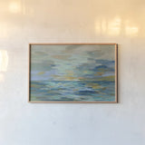Pastel Blue Sea by Silvia Vassileva. shown as a paper print in a natural frame. Available as a archival giclee rolled canvas, fine art paper, or poster print. SKU 50135i.
