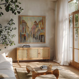 Pastel Street II by Silvia Vassileva. Shown in a natural wood frame in a cozy modern living room. Available as an archival giclee rolled canvas, fine art paper, or poster print. SKU 70143a.