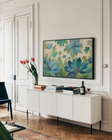 Peacock Bloom by Silvia Vassileva. shown as a framed stretched canvas in a living room above a console. Available as a archival giclee rolled canvas, fine art paper, or poster print. SKU 23509i.
