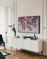 Pink and Blue I Crop by Silvia Vassileva. shown as a framed stretched canvas in a living room above a console. Available as a archival giclee rolled canvas, fine art paper, or poster print. SKU 21899i.