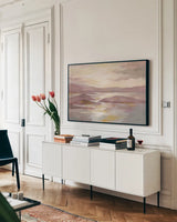 Pink and Gold Landscape by Silvia Vassileva. shown as a framed stretched canvas in a living room above a console. Available as a archival giclee rolled canvas, fine art paper, or poster print. SKU 71970i.