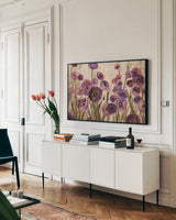 Pink and Purple Flowers by Silvia Vassileva. shown as a framed stretched canvas in a living room above a console. Available as a archival giclee rolled canvas, fine art paper, or poster print. SKU 10598i.