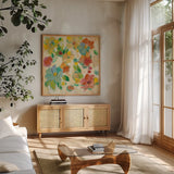 Playful Floral Trio II by Silvia Vassileva. Shown in a natural wood frame in a cozy modern living room. Available as an archival giclee rolled canvas, fine art paper, or poster print. SKU 46653a.