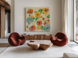 Playful Floral Trio III by Silvia Vassileva. Shown as extra-large giant wall art in a modern living room. Available as an archival giclee rolled canvas, fine art paper, or poster print. SKU 46654a.