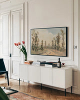 Poplars by the Road by Silvia Vassileva. shown as a framed stretched canvas in a living room above a console. Available as a archival giclee rolled canvas, fine art paper, or poster print. SKU 86523i.