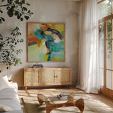 Rainbow on the Asphalt by Silvia Vassileva. Shown in a natural wood frame in a cozy modern living room. Available as an archival giclee rolled canvas, fine art paper, or poster print. SKU 63903a.