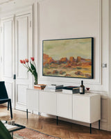 Red Rocks by Silvia Vassileva. shown as a framed stretched canvas in a living room above a console. Available as a archival giclee rolled canvas, fine art paper, or poster print. SKU 103194i.