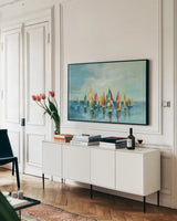 Regatta by Silvia Vassileva. shown as a framed stretched canvas in a living room above a console. Available as a archival giclee rolled canvas, fine art paper, or poster print. SKU 62961i.