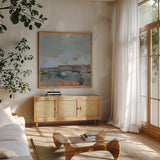 River and Sky II by Silvia Vassileva. Shown in a natural wood frame in a cozy modern living room. Available as an archival giclee rolled canvas, fine art paper, or poster print. SKU 96741a.
