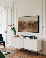 Riverbank with Green Crop by Silvia Vassileva. shown as a framed stretched canvas in a living room above a console. Available as a archival giclee rolled canvas, fine art paper, or poster print. SKU 87820i.