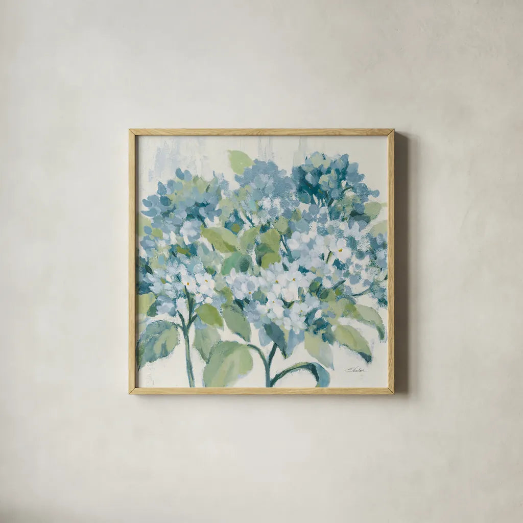 Romantic Hydrangeas Blue by Silvia Vassileva. Shown in a natural wood glass frame for a timeless modern aesthetic. Available as an archival giclee rolled canvas, fine art paper, or poster print. SKU 85227a.