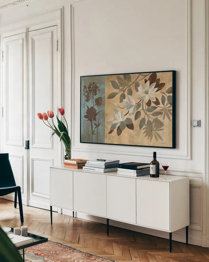 Romantic Magnolias I by Silvia Vassileva. shown as a framed stretched canvas in a living room above a console. Available as a archival giclee rolled canvas, fine art paper, or poster print. SKU 6485i.