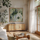 Sage and Lavender Peonies III by Silvia Vassileva. Shown in a natural wood frame in a cozy modern living room. Available as an archival giclee rolled canvas, fine art paper, or poster print. SKU 48717a.