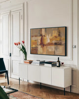 Sandcastles by Silvia Vassileva. shown as a framed stretched canvas in a living room above a console. Available as a archival giclee rolled canvas, fine art paper, or poster print. SKU 11616i.
