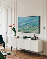 Seabed by Silvia Vassileva. shown as a framed stretched canvas in a living room above a console. Available as a archival giclee rolled canvas, fine art paper, or poster print. SKU 66071i.