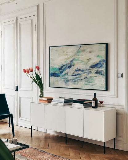 Seawave by Silvia Vassileva. shown as a framed stretched canvas in a living room above a console. Available as a archival giclee rolled canvas, fine art paper, or poster print. SKU 28117i.