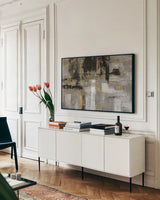 Smoky Harbor Sunset by Silvia Vassileva. shown as a framed stretched canvas in a living room above a console. Available as a archival giclee rolled canvas, fine art paper, or poster print. SKU 67381i.