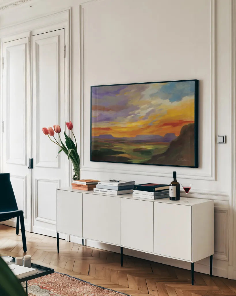 Sonoran Desert Sunset by Silvia Vassileva. shown as a framed stretched canvas in a living room above a console. Available as a archival giclee rolled canvas, fine art paper, or poster print. SKU 70146i.