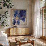 Sparkle Abstract II Blue by Silvia Vassileva. Shown in a natural wood frame in a cozy modern living room. Available as an archival giclee rolled canvas, fine art paper, or poster print. SKU 65019a.