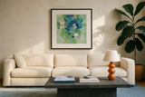 Spring Aroma II White Flowers by Silvia Vassileva. Displayed in a glass frame with matte in a clean modern living room. Available as an archival giclee rolled canvas, fine art paper, or poster print. SKU 23198a.