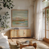 Spring Desert II v2 by Silvia Vassileva. Shown in a natural wood frame in a cozy modern living room. Available as an archival giclee rolled canvas, fine art paper, or poster print. SKU 33911a.