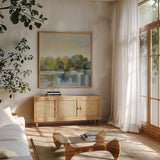 Spring Willows by Silvia Vassileva. Shown in a natural wood frame in a cozy modern living room. Available as an archival giclee rolled canvas, fine art paper, or poster print. SKU 95136a.