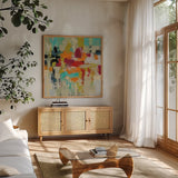 Summer Silk Road by Silvia Vassileva. Shown in a natural wood frame in a cozy modern living room. Available as an archival giclee rolled canvas, fine art paper, or poster print. SKU 24573a.