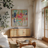 Summer Silk Road Bright by Silvia Vassileva. Shown in a natural wood frame in a cozy modern living room. Available as an archival giclee rolled canvas, fine art paper, or poster print. SKU 33627a.