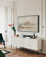 The Old Farm Landscape by Silvia Vassileva. shown as a framed stretched canvas in a living room above a console. Available as a archival giclee rolled canvas, fine art paper, or poster print. SKU 74755i.