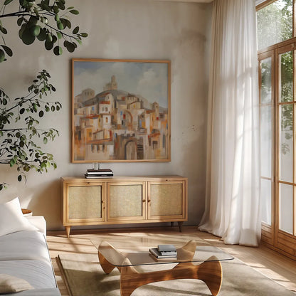 Town on the Hill Sq by Silvia Vassileva. Shown in a natural wood frame in a cozy modern living room. Available as an archival giclee rolled canvas, fine art paper, or poster print. SKU 95753a.