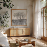 Trees at Dawn II Neutral by Silvia Vassileva. Shown in a natural wood frame in a cozy modern living room. Available as an archival giclee rolled canvas, fine art paper, or poster print. SKU 60555a.