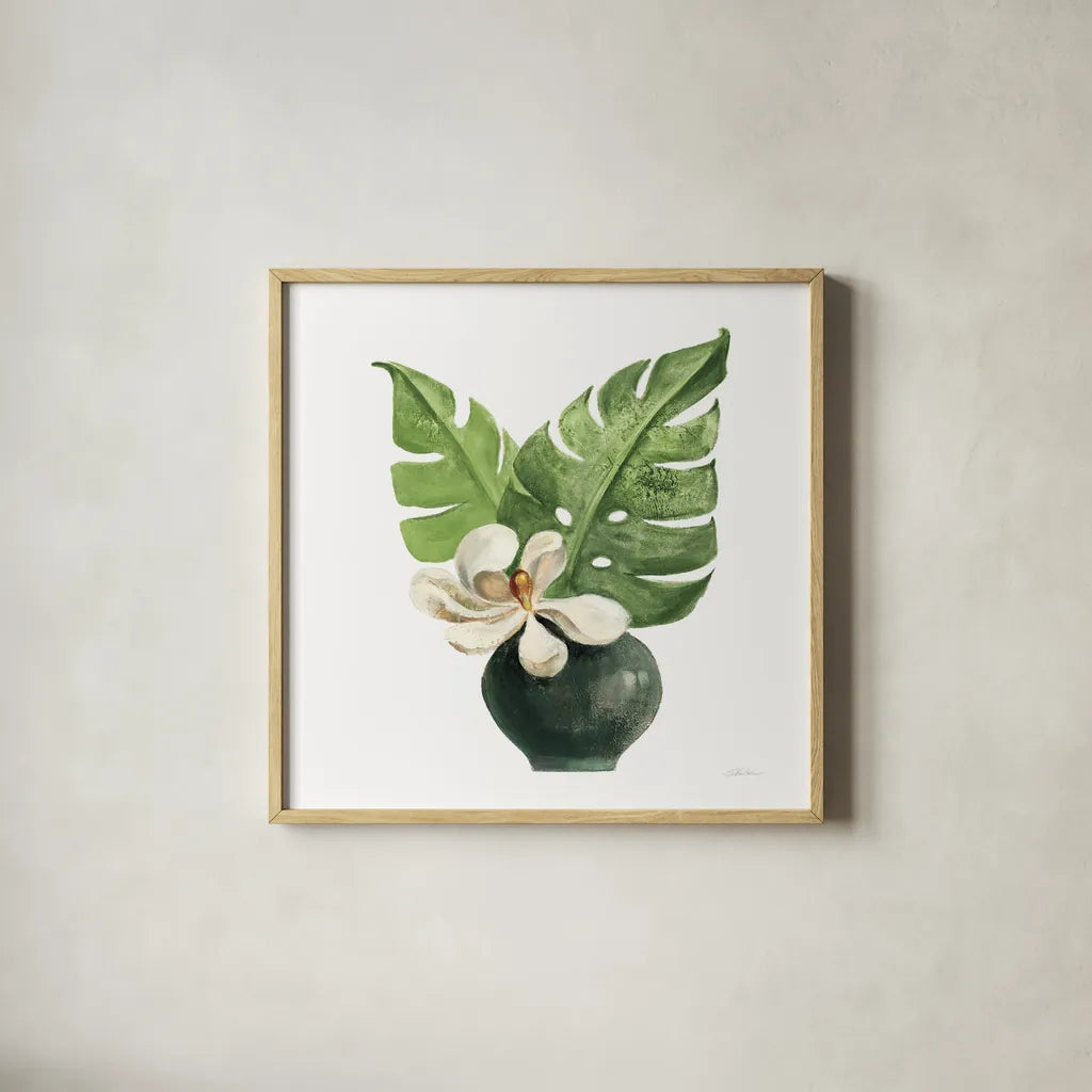 Tropical Leaves II on White by Silvia Vassileva. Shown in a natural wood glass frame for a timeless modern aesthetic. Available as an archival giclee rolled canvas, fine art paper, or poster print. SKU 50325a.