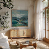 Turquoise Slopes I by Silvia Vassileva. Shown in a natural wood frame in a cozy modern living room. Available as an archival giclee rolled canvas, fine art paper, or poster print. SKU 78735a.