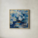 Ultramarine Waves I by Silvia Vassileva. Shown in a natural wood glass frame for a timeless modern aesthetic. Available as an archival giclee rolled canvas, fine art paper, or poster print. SKU 24574a.