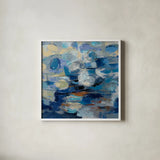Ultramarine Waves I by Silvia Vassileva. Shown in a crisp white glass frame for a clean and minimalist style. Available as an archival giclee rolled canvas, fine art paper, or poster print. SKU 24574a.