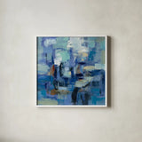 Ultramarine Waves II by Silvia Vassileva. Shown in a crisp white glass frame for a clean and minimalist style. Available as an archival giclee rolled canvas, fine art paper, or poster print. SKU 24575a.