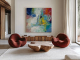 Vibrant Rainbow by Silvia Vassileva. Shown as extra-large giant wall art in a modern living room. Available as an archival giclee rolled canvas, fine art paper, or poster print. SKU 64154a.